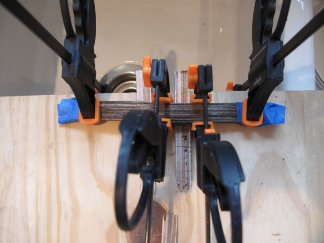 Bordello roof rafters clamped to bend