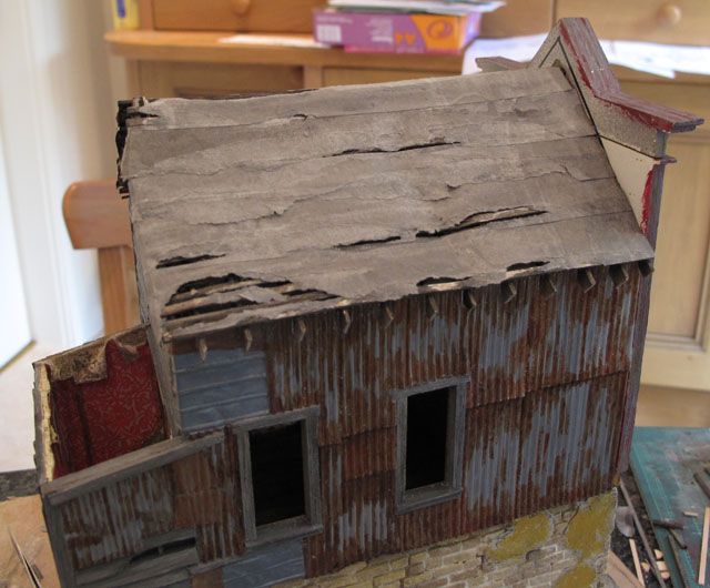 More torn tar paper