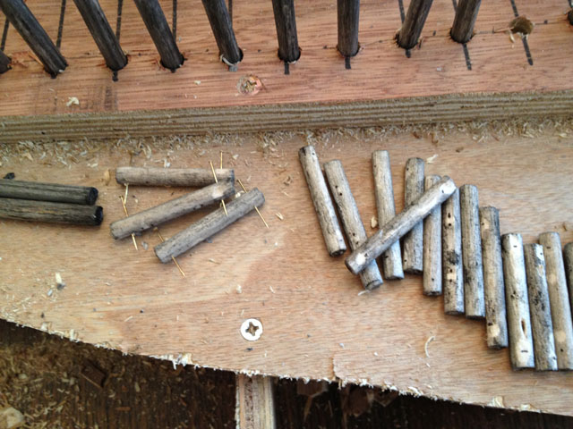 close up of pins for holding ties to piles