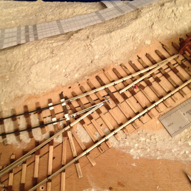 Dual gauge separation turnout